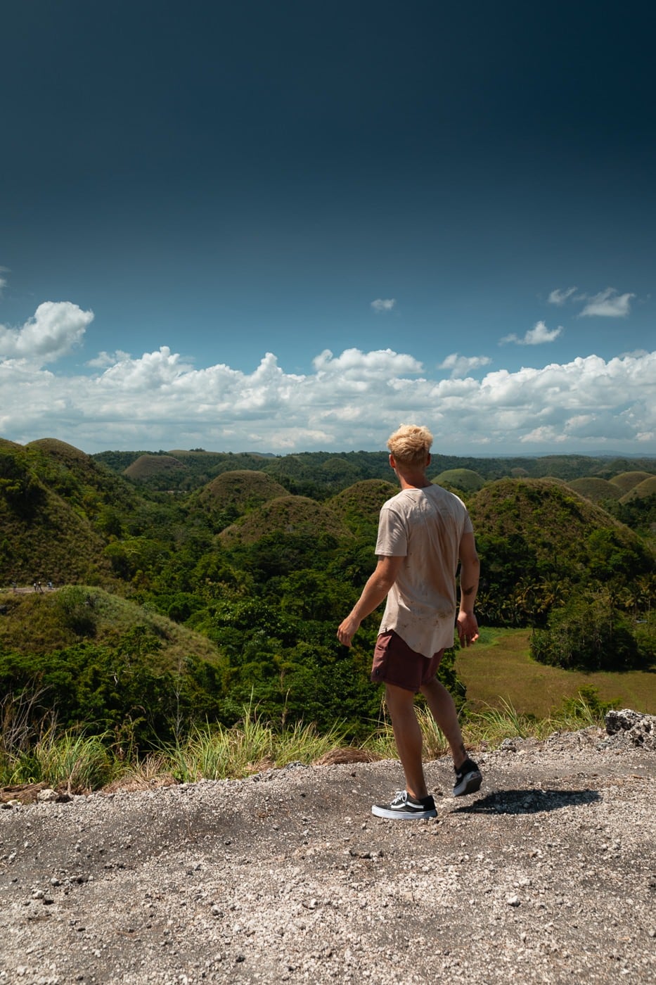 Riding An Atv Through The Chocolate Hills Of Bohol Looking out over the green chocolate hills from a roadside viewpoint in carmen, bohol
