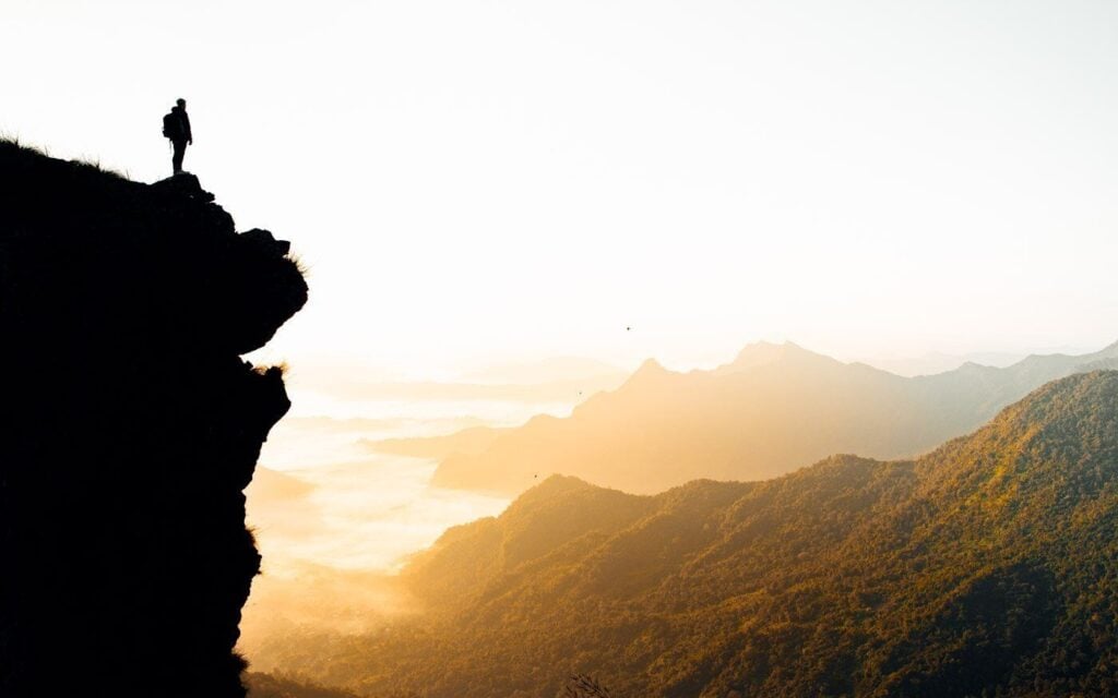 Guide To Phu Chi Fa: Sea Of Mist Viewpoint From Chiang Rai Travelers standing at a viewpoint in northern thailand