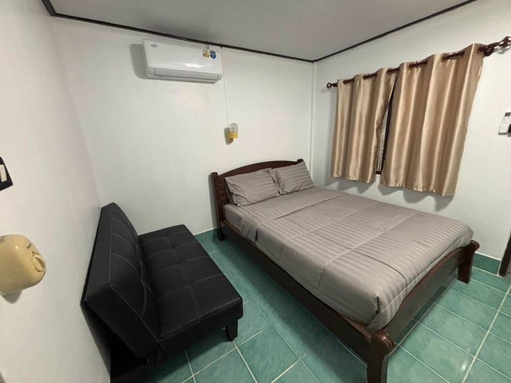 Simple room with air conditioning at Alanta Ao Nang Resort.