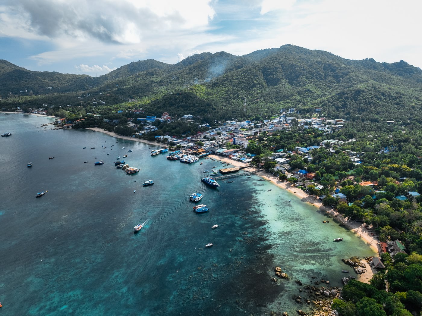 Koh Tao Vs Koh Samui: Which Island Should You Pick? Mae haad pier on koh tao with the ferry alongside