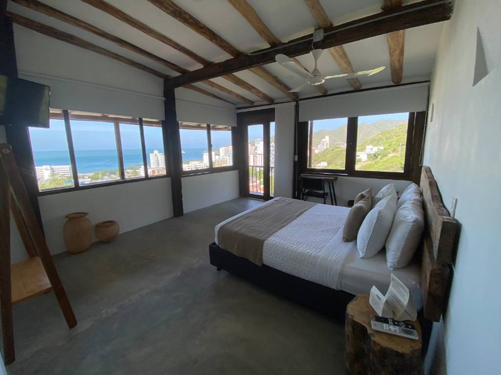 Bedroom with ocean view at Akela Gaira Hotel 