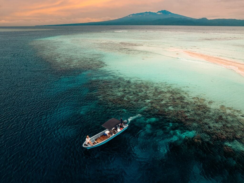 Fatboys Resort Review: My Honest Take After Visiting Fishing boat island hopping in the solomon islands wester provinces at sunset