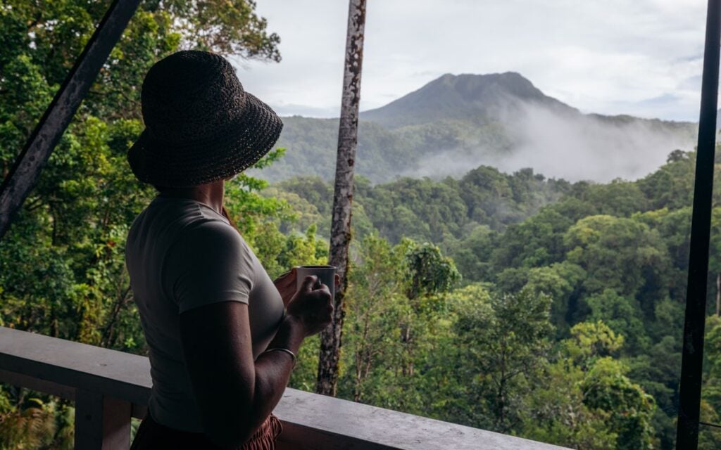 Solomon Islands Eco Lodges &Amp; Dive Resorts Guide Traveler overlooking kolombangara island viewpoint from imbu rano lodge, solomon islands