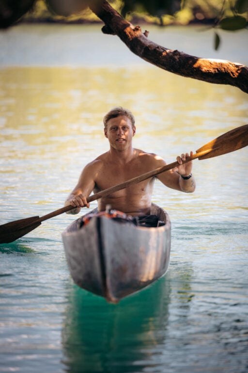 About Olly Gaspar &Amp; We Seek Travel Olly gaspar rowing a traditional canoe in the solomon islands