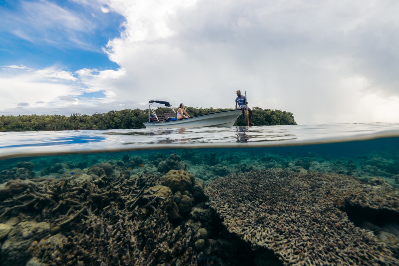 Titiru Eco Lodge Review: Rendova’s Best Local Stay Boat over corals on rendova island
