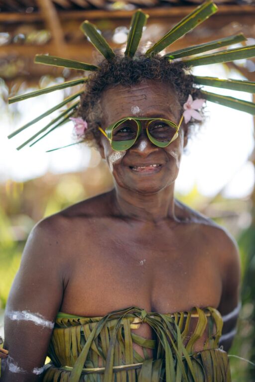 Local Solomon Islands woman in leaf glasses