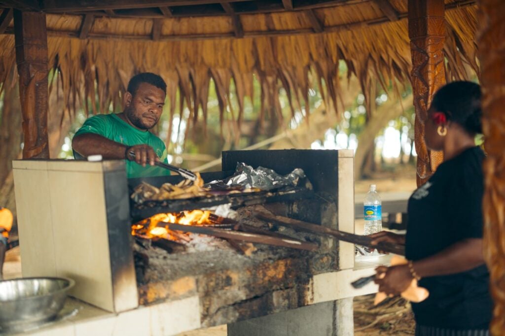 Solomon Islanders cooking on a bbq