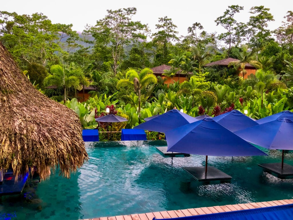 Pool with bar surrounded by jungle in Costa Rica
