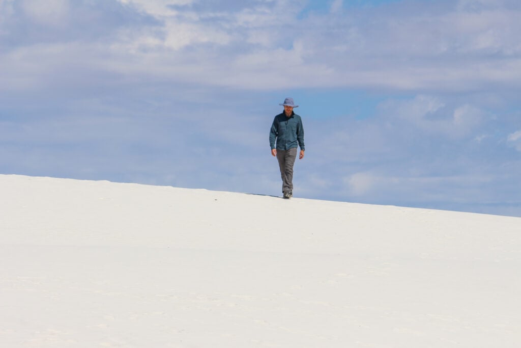 One Day In White Sands: The Perfect Itinerary Walking down a dune